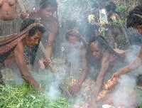 Women cooking potato
