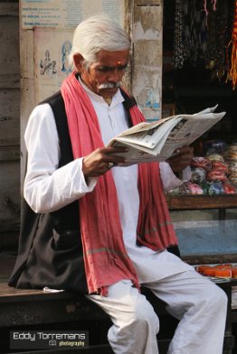 Pushkar Reading the news at roadside January 1, 2020