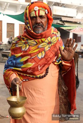 Guru A guru, or a holy man strolling through the streets of Pushkar in the early morning. January 1, 2020