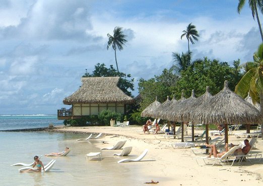Sunbathing One of the man-made beaches at the Moorea Beachcomber - april 2004
