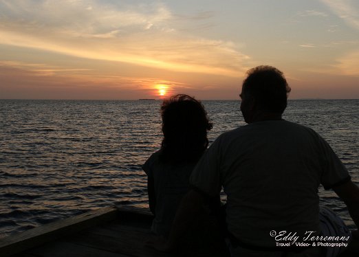 Sunset-9 Watching sunset together with this cute little girl from Sawinggarai. Raja Ampat - Indonesia - january 2016