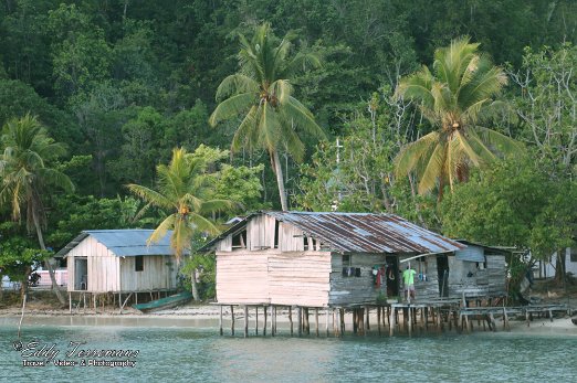 Village-17 Typical home at Raja Ampat, usually built on stilts above the waterfront. Raja Ampat - Indonesia - january 2016