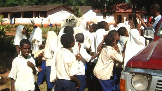 School visit As soon I stopped our vehicle in front of this school, kids came running up to this white fella - Zanzibar - Tanzania - August 2006